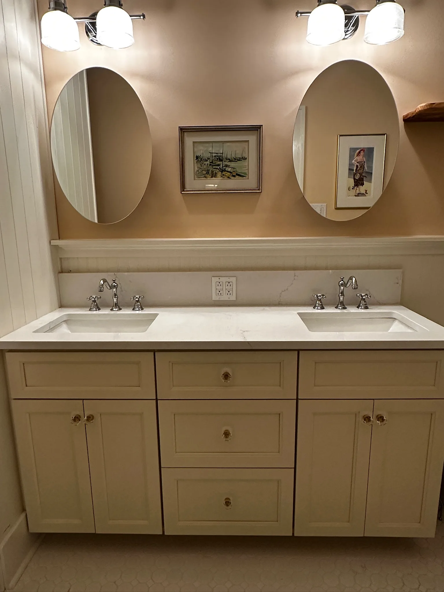 Front view of cream inset double vanity with quartz top and crystal hardware by Sims Custom Woodwork — custom bathroom vanities serving Chattanooga, TN and North Georgia.