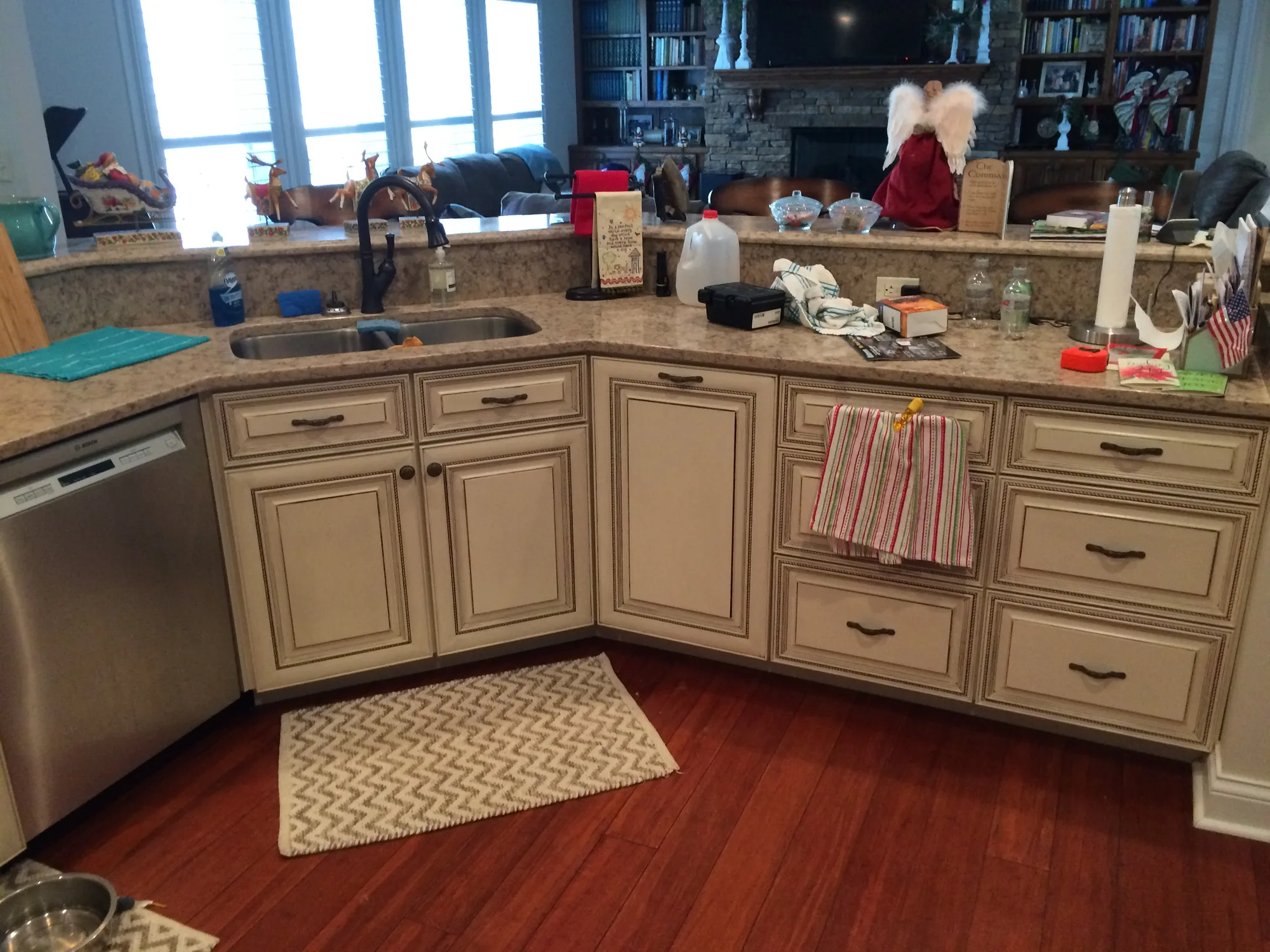 Custom perimeter kitchen cabinetry with upper and lower cabinets.
