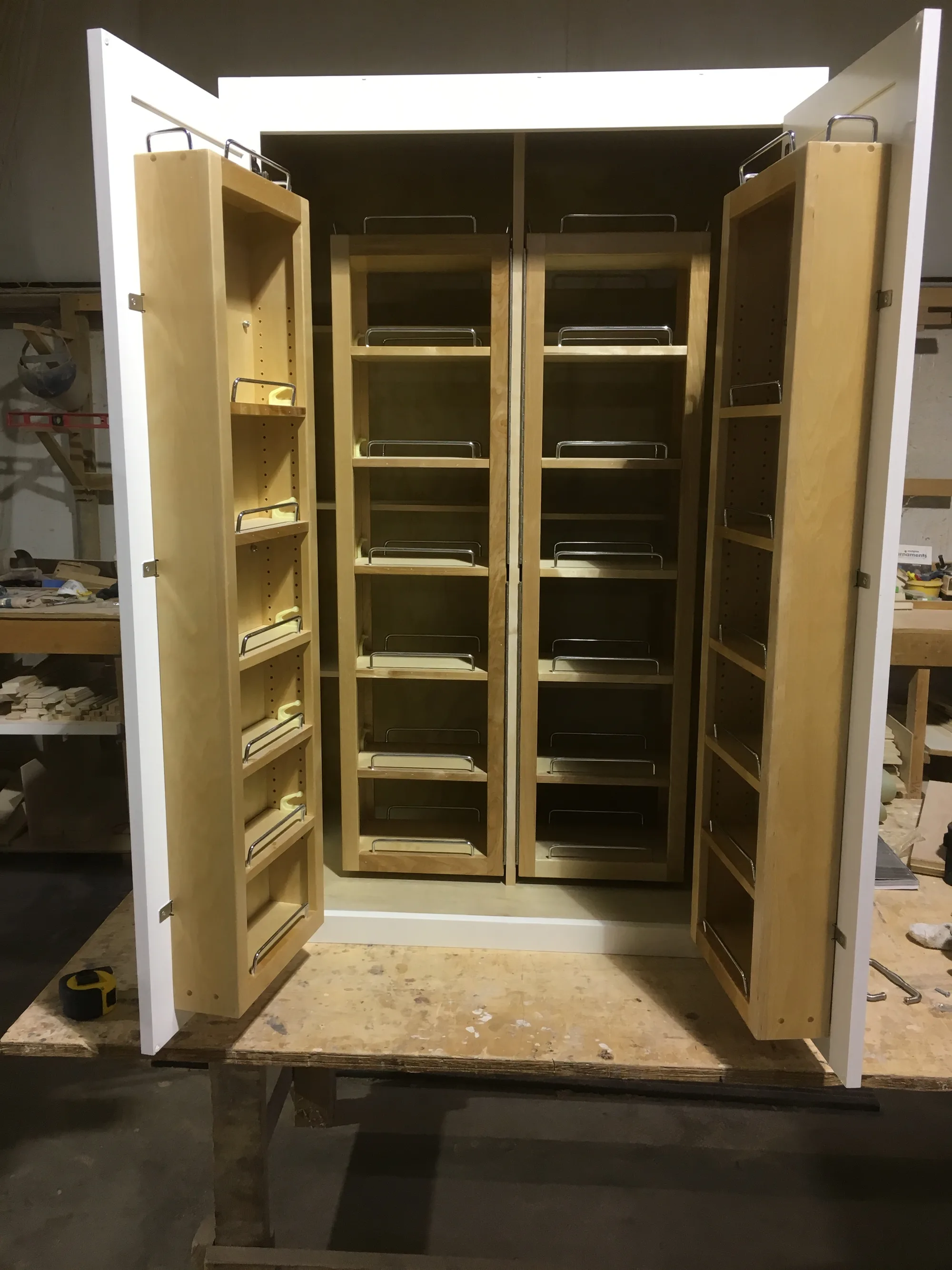 Custom pantry shelving interior with dado joints.