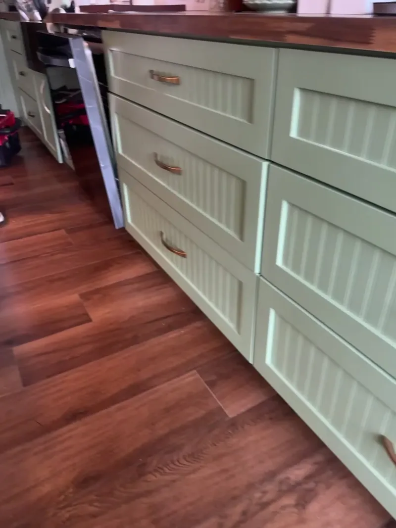 Video tour of sage green beadboard kitchen island with brass pulls and walnut countertop by Sims Custom Woodwork.