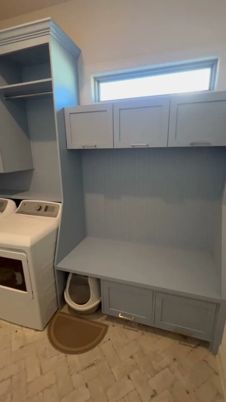 Video walkthrough of complete blue-grey laundry room cabinetry by Sims Custom Woodwork.